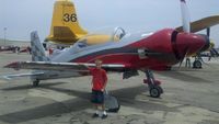 My youngest by my frnds plane. Yes I'm a pilot.