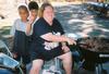 Me and my two youngest boys on the 4th of July, getting the meat going for the BBq