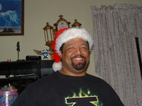 At Mom's house for Christmas. Yes, I do wear the Santa as much as they let me get away with.