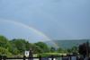 Very rare double rainbow over my back yard. 