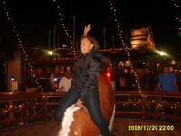 Riding the mechanical bull at a friend's birthday party.