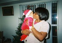 I'm kissing my four month old nephew on Christmas day of 2008