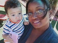 Me & my nephew. Got a little bit of 'baby fever'... which was quickly remedied when it was time for him to go to bed and  when he woke up at 4:30a! LOL!! (12/23/11)