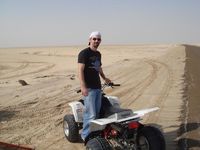 Me hanging out on my four wheeler at the dunes.
