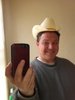 Howdy doodie! Woohoo! Me in my cowboy hat. Yeehaw! (not really my cowboy hat, mine is much larger for my unusually large head)
