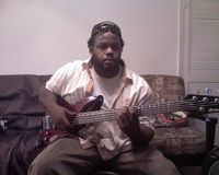 working on last minute bass line. My friends like to take'guerrilla style' photos. so i can't run away. 