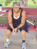 resting from working out. those are not mismatched socks - it's an ankle brace :)